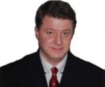 Christopher J Mathews